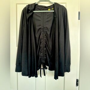 Black Jacket with a cute ruched back. Size L.